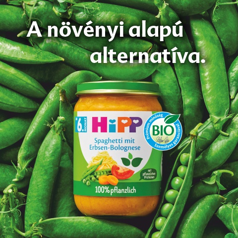 A "Spaghetti mit Erbsen-Bolognese" feliratú bébiételes üveget zöldborsó veszi körül.